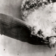 The German Zeppelin Hindenburg erupts into flames while attempting to land at Lakehurst, New Jersey (US Navy)